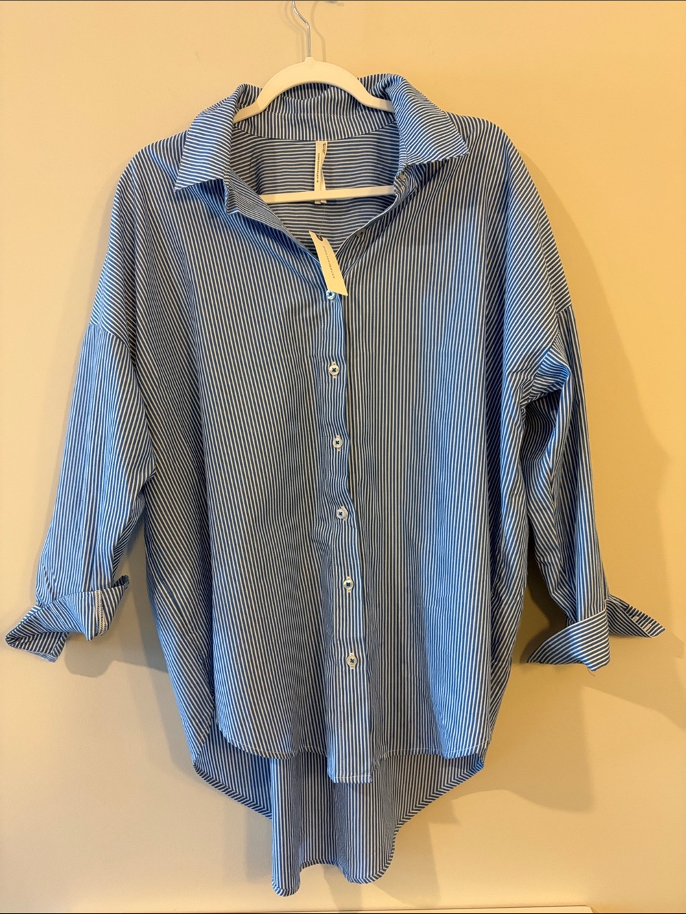 Oversized Anthropologie blue and white striped button-down shirt